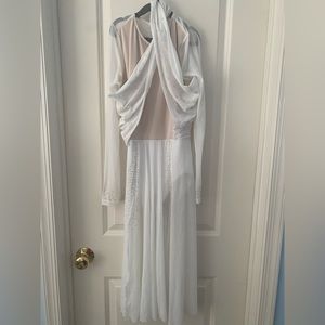 White lyrical costume with stoning. Used excellent condition